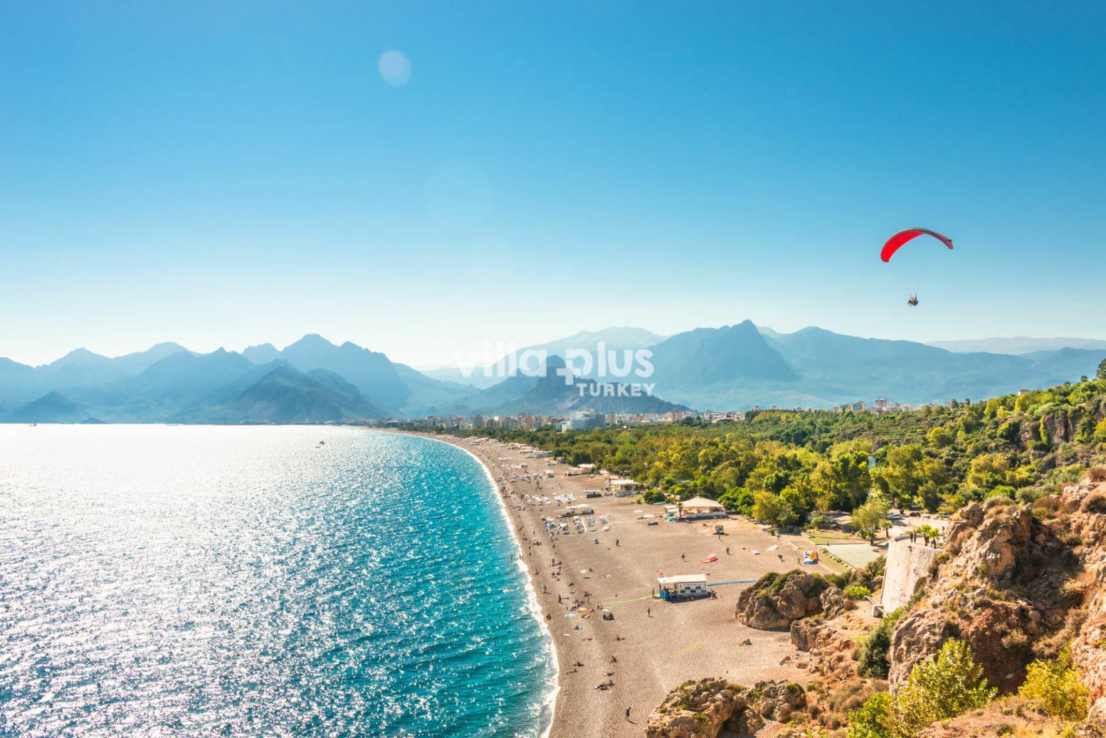 a beach and paragliding in Antalya