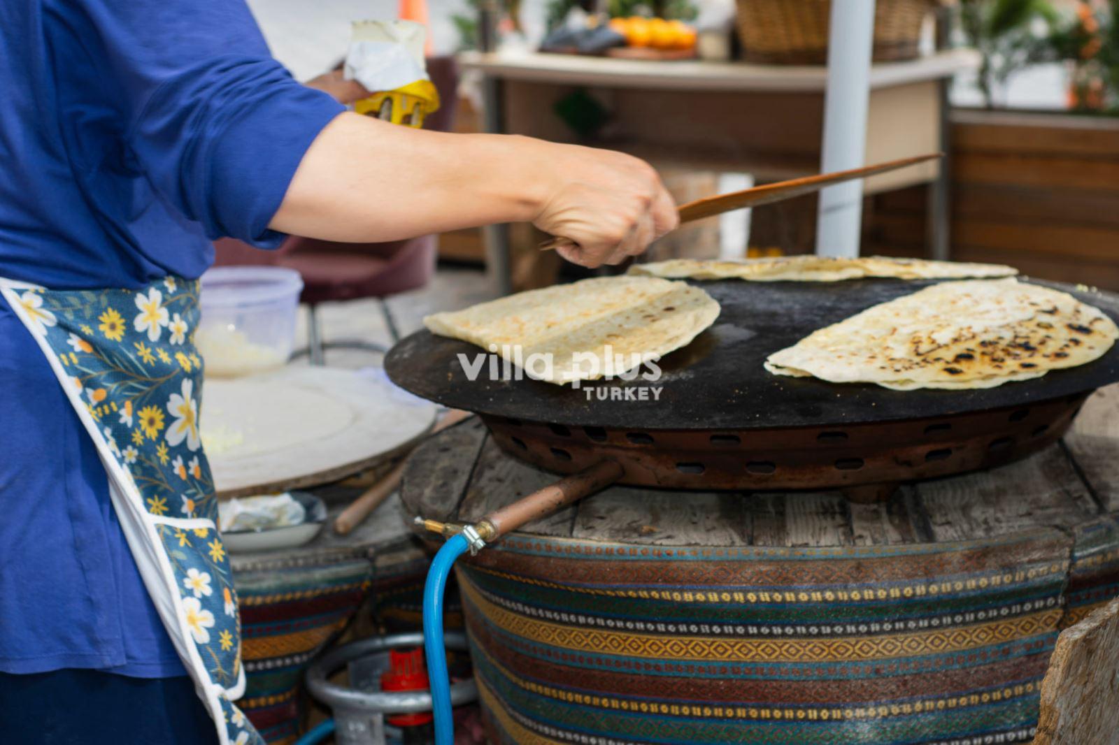a woman doing turkish pancake